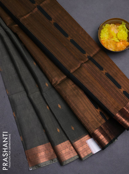 Kora silk cotton saree grey and bottle green with zari woven geometric buttas and zari woven border