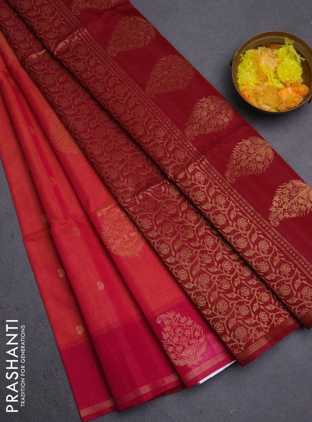 Kora silk cotton saree dual shade of pinkish orange and maroon with zari woven buttas and zari woven butta border
