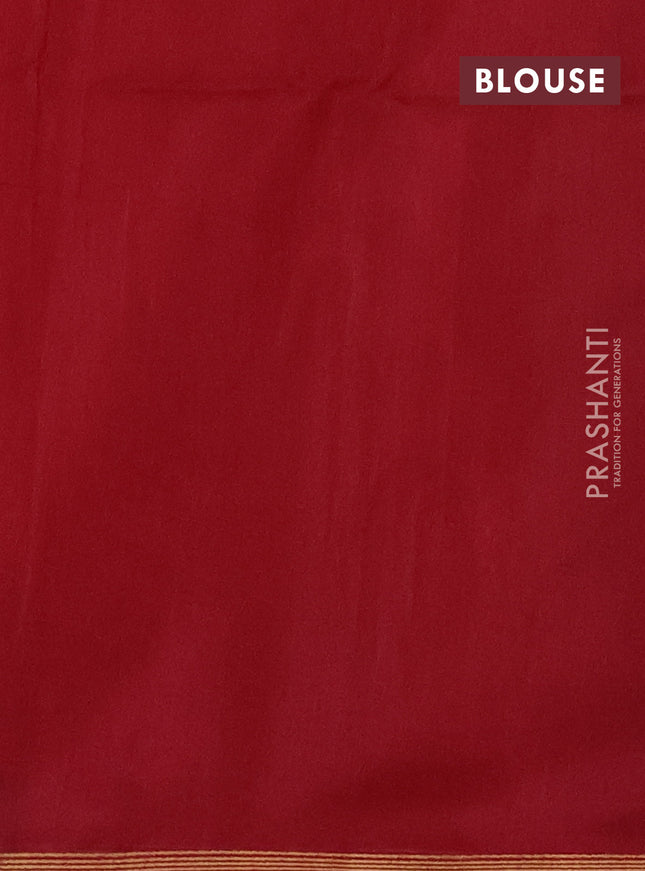 Kora silk cotton saree dual shade of pinkish orange and maroon with zari woven buttas and zari woven butta border