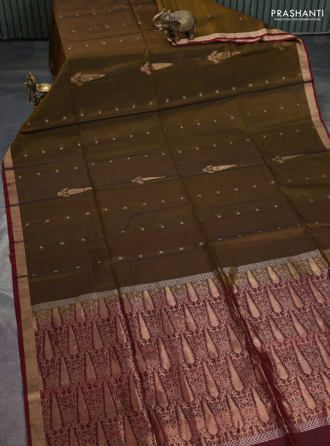 Kora silk cotton saree dark mehendi green and deep maroon with zari woven buttas and zari woven border