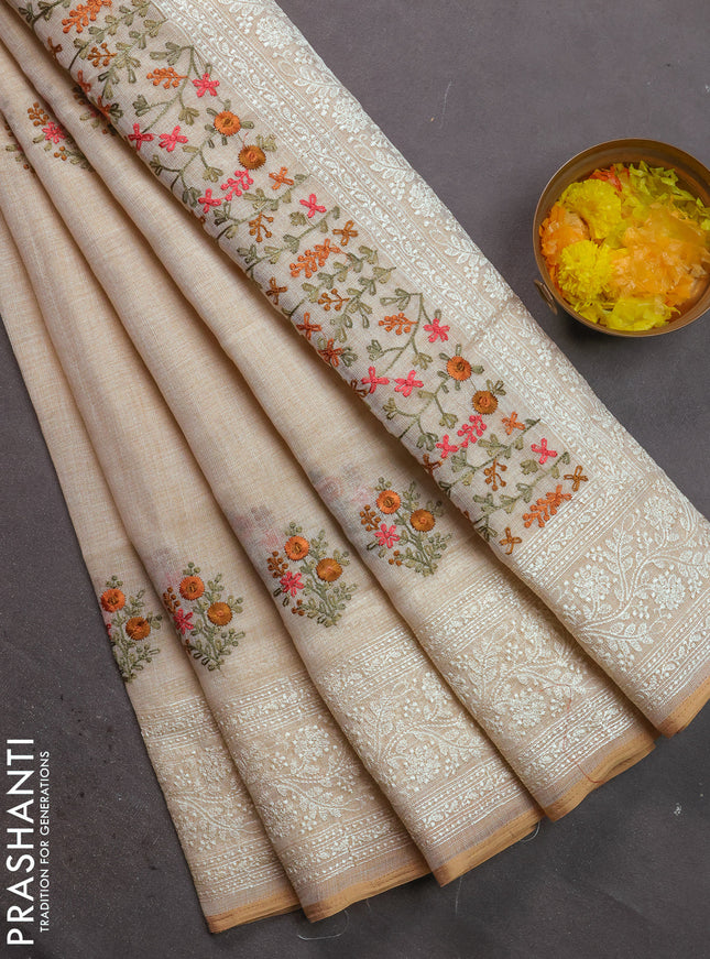 Linen cotton saree cream and pastel green with kantha stitch work and embroidered border