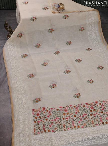 Linen cotton saree cream and pastel green with kantha stitch work and embroidered border