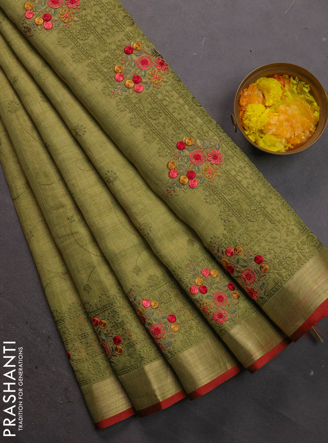 Linen cotton saree light green with allover embroidery work and embroidered zari border