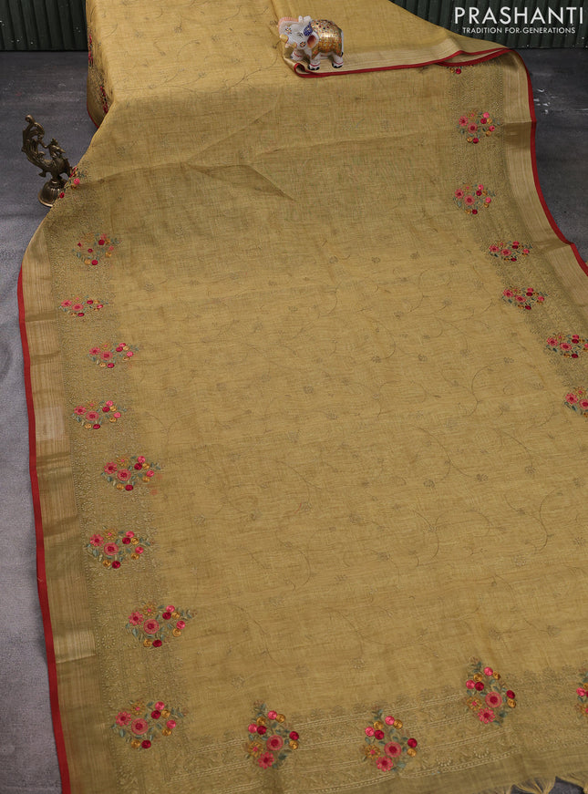 Linen cotton saree lime green with allover embroidery work and embroidered zari border