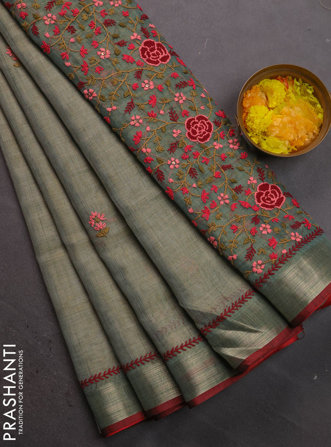 Linen cotton saree pastel green with kantha stitch work and zari woven border