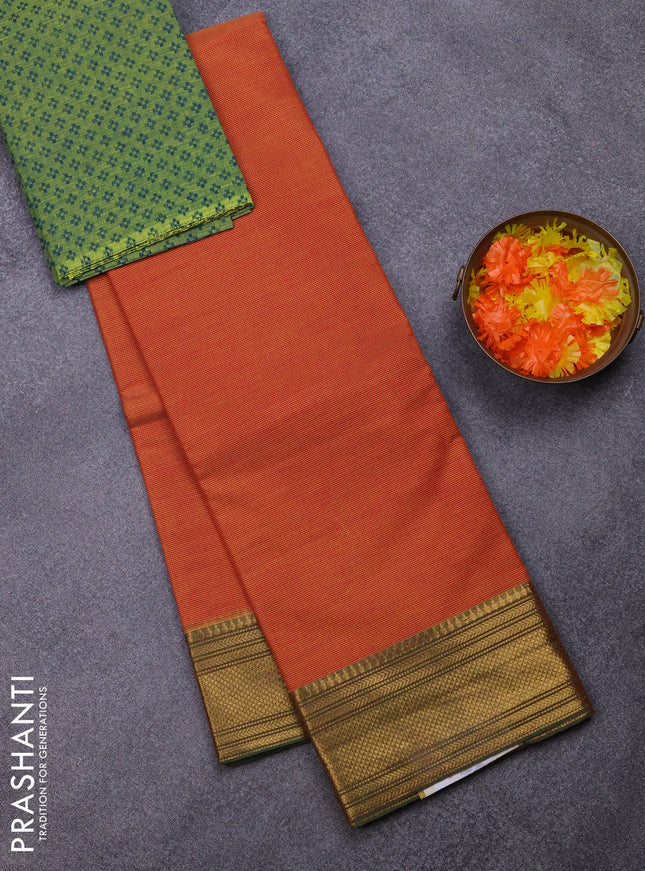 Chettinad cotton saree rust shade and green with allover small checked pattern and zari woven border