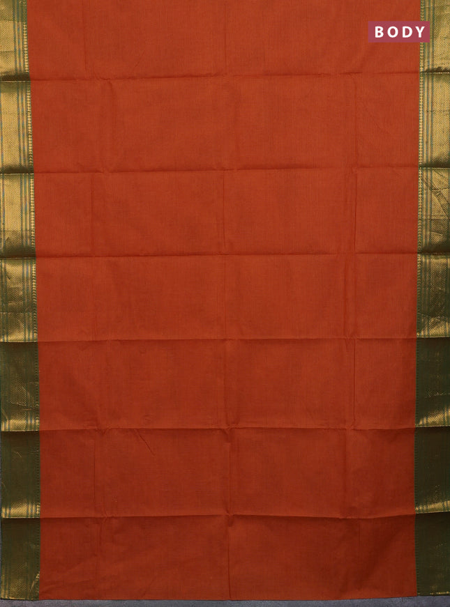 Chettinad cotton saree rustic orange and green with allover small checked pattern and zari woven border