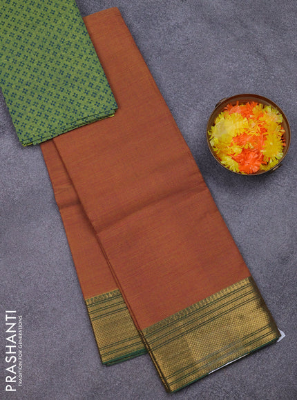 Chettinad cotton saree rust shade and light green with alllover small checked pattern and zari woven border