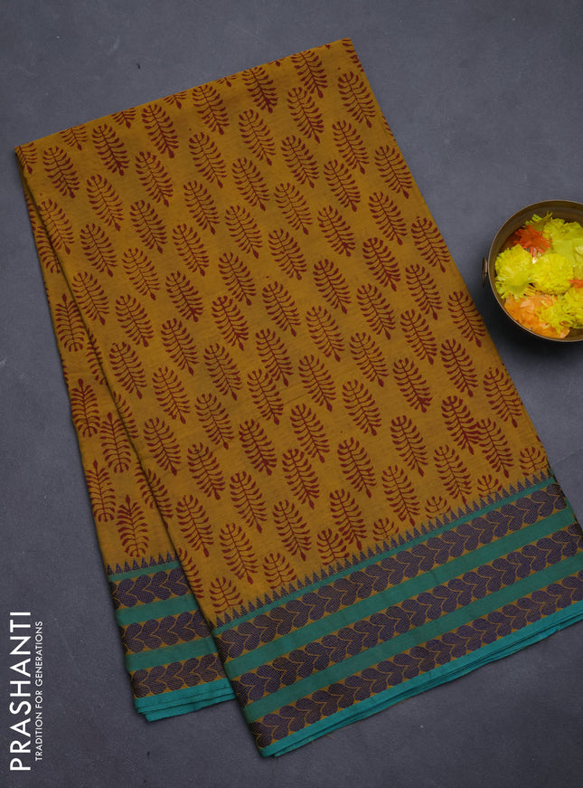 Chettinad cotton saree dark mustard and teal green with allover butta prints and thread woven border