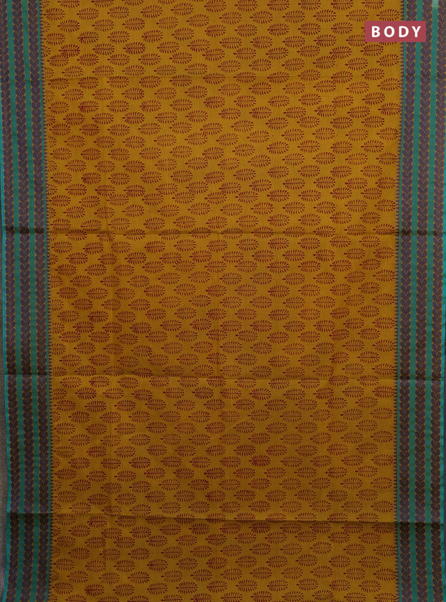Chettinad cotton saree dark mustard and teal green with allover butta prints and thread woven border