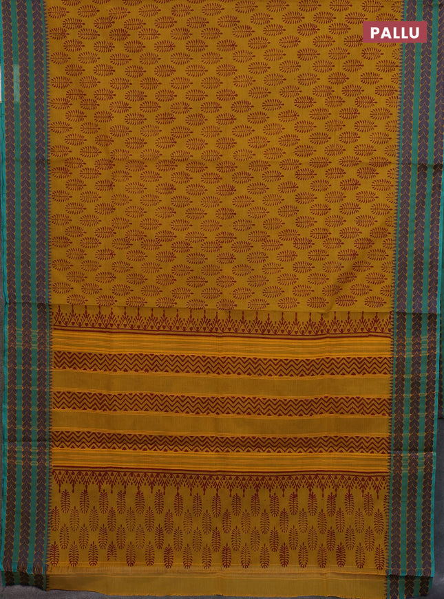 Chettinad cotton saree dark mustard and teal green with allover butta prints and thread woven border