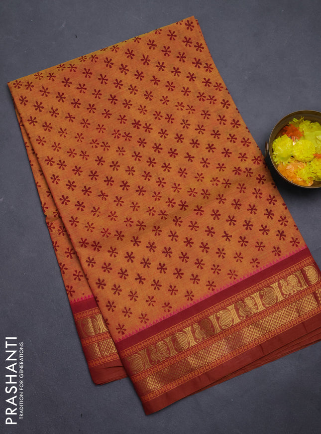 Chettinad cotton saree orange and rust shade with allover butta prints and zari woven border