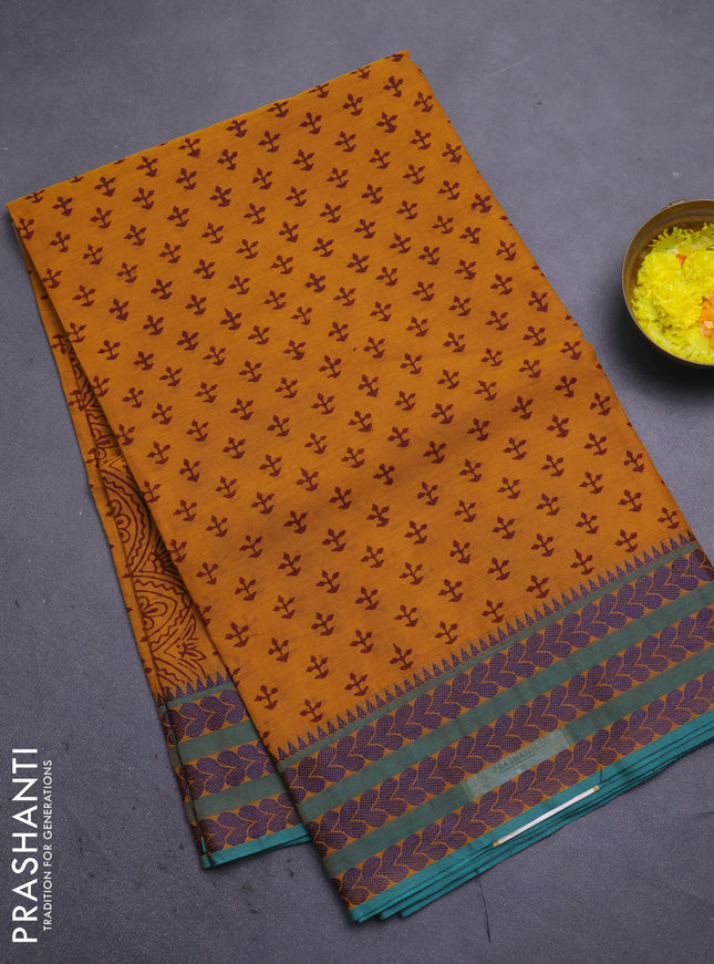 Chettinad cotton saree dark mustard and teal green with allover butta prints and thread woven border