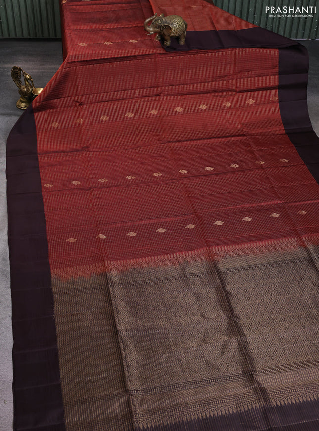 Pure soft silk saree rust shade and coffee brown with allover zari checks & buttas and simple border