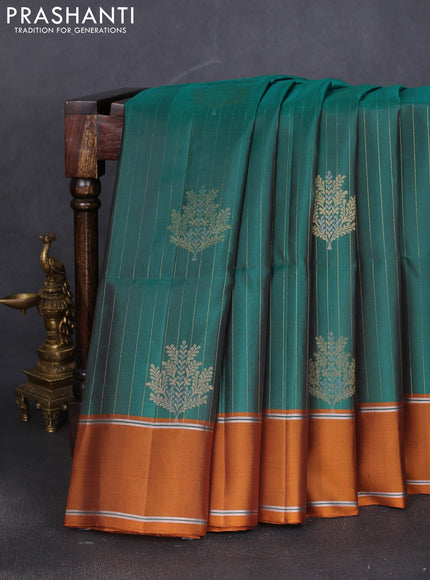 Pure soft silk saree dual shade of green and dark mustard with allover zari weaves & buttas and zari woven border