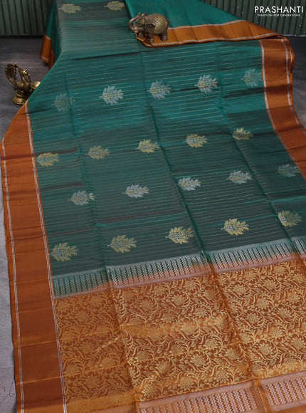 Pure soft silk saree dual shade of green and dark mustard with allover zari weaves & buttas and zari woven border