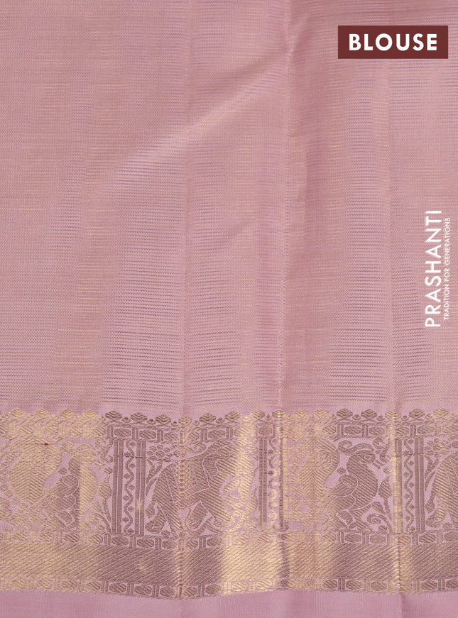 Pure kanchipuram silk saree pastel peach shade with allover zari weaves & buttas and rich zari woven border