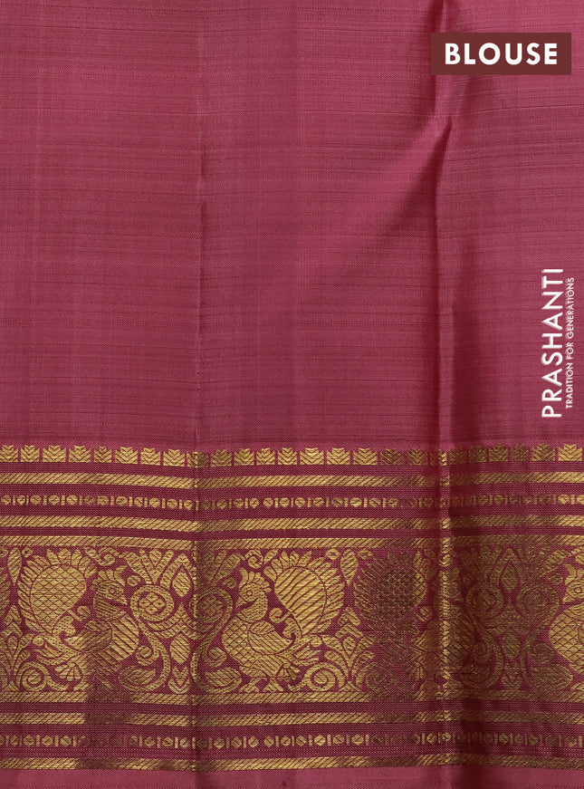 Pure kanchipuram silk saree pastel peach shade and peach shade with floral zari woven buttas and rich zari woven border