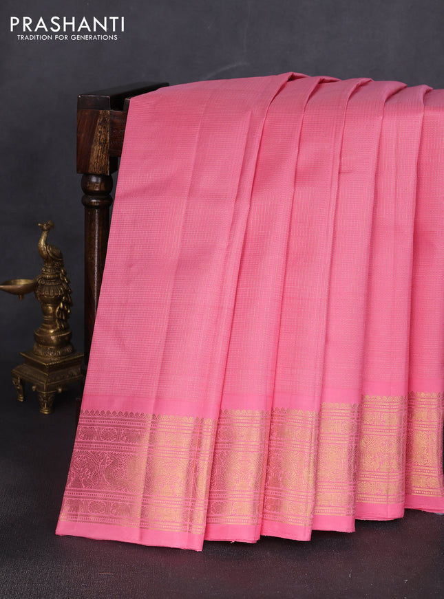 Pure kanchipuram silk saree peach pink with allover small zari woven checked pattern and rich zari woven border
