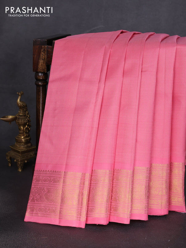 Pure kanchipuram silk saree peach pink with allover small zari woven checked pattern and rich zari woven border