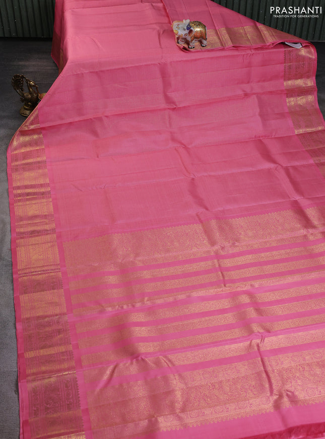 Pure kanchipuram silk saree peach pink with allover small zari woven checked pattern and rich zari woven border