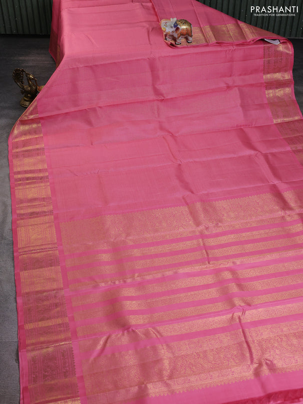 Pure kanchipuram silk saree peach pink with allover small zari woven checked pattern and rich zari woven border