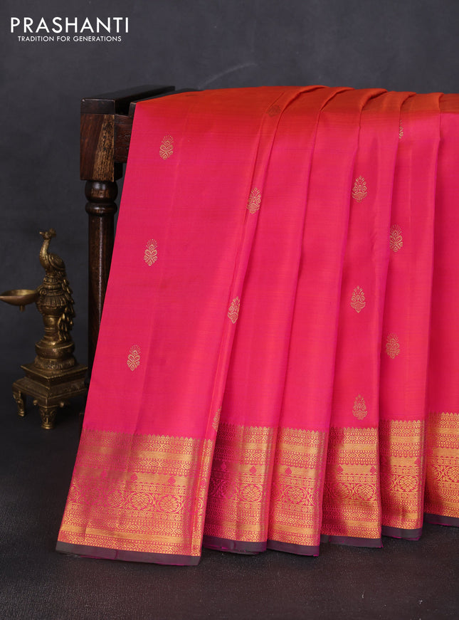 Pure kanchipuram silk saree dual shade of pinkish orange and dual shade of green with zari woven buttas and rich zari woven border