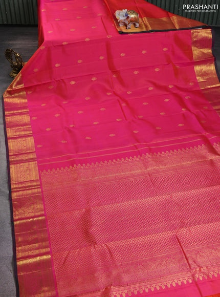 Pure kanchipuram silk saree dual shade of pinkish orange and dual shade of green with zari woven buttas and rich zari woven border