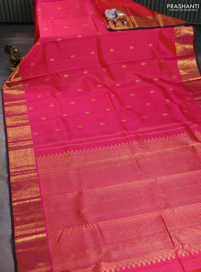 Pure kanchipuram silk saree dual shade of pinkish orange and dual shade of green with zari woven buttas and rich zari woven border