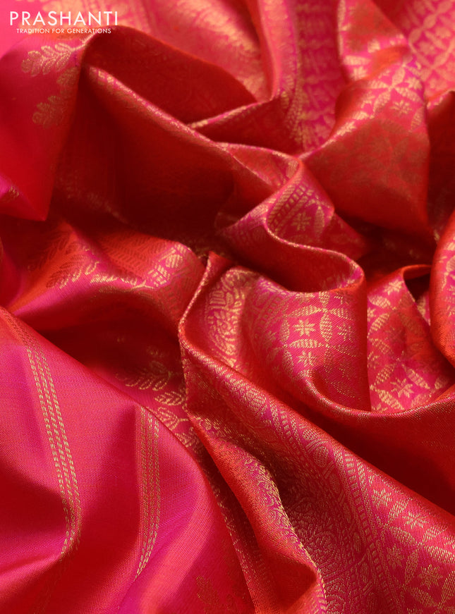 Pure kanchipuram silk saree dual shade of pinkish orange and dual shade of green with zari woven buttas and rich zari woven border