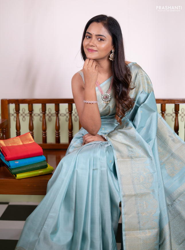Pure kanchipuram silk saree pastel blue with zari woven buttas and rich zari woven border