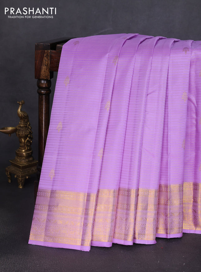 Pure kanchipuram silk saree lavender with allover zari strips & buttas and rich zari woven border
