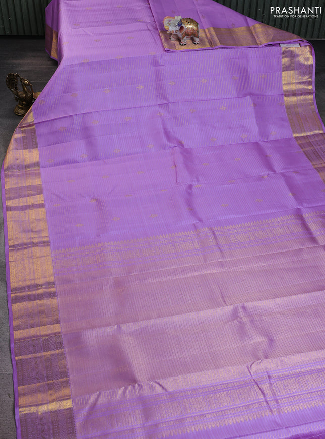 Pure kanchipuram silk saree lavender with allover zari strips & buttas and rich zari woven border