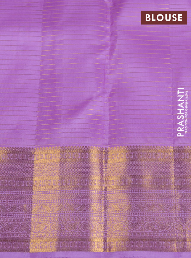 Pure kanchipuram silk saree lavender with allover zari strips & buttas and rich zari woven border