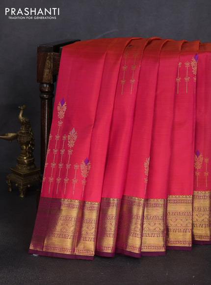 Pure kanchipuram silk saree dual shade of pinkish orange and wine shade with zari woven buttas and rich zari woven border