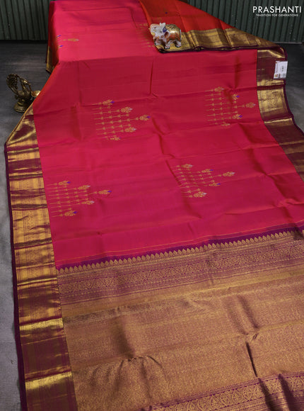 Pure kanchipuram silk saree dual shade of pinkish orange and wine shade with zari woven buttas and rich zari woven border
