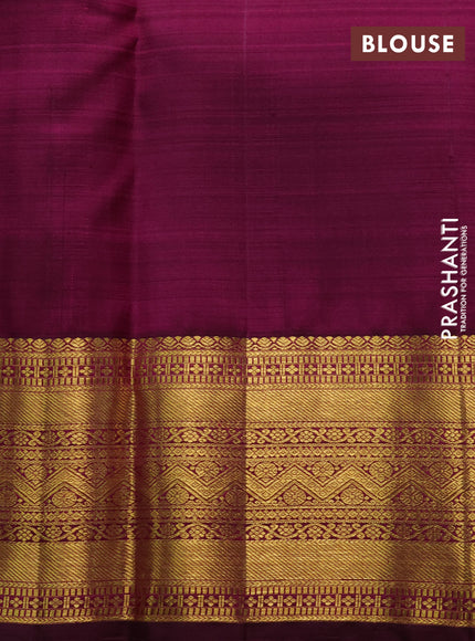 Pure kanchipuram silk saree dual shade of pinkish orange and wine shade with zari woven buttas and rich zari woven border