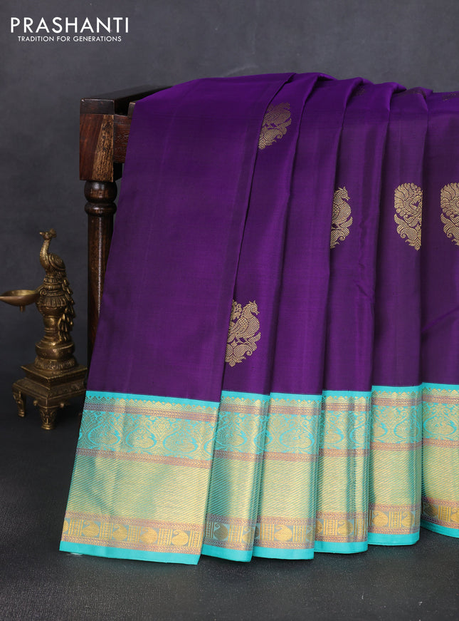 Pure kanchipuram silk saree violet and teal green shade with annam zari woven buttas and rich zari woven korvai border