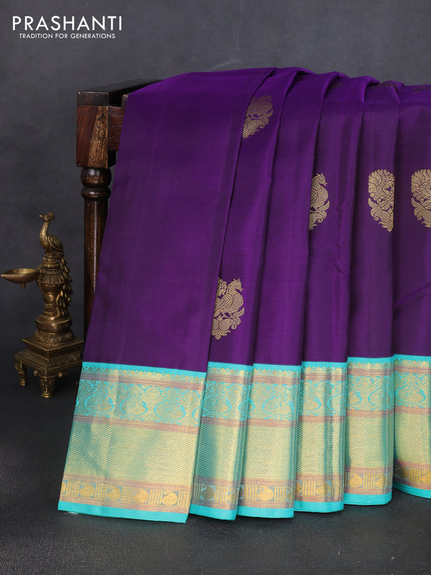 Pure kanchipuram silk saree violet and teal green shade with annam zari woven buttas and rich zari woven korvai border