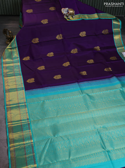 Pure kanchipuram silk saree violet and teal green shade with annam zari woven buttas and rich zari woven korvai border