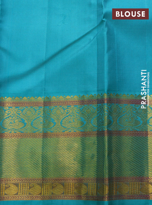 Pure kanchipuram silk saree violet and teal green shade with annam zari woven buttas and rich zari woven korvai border