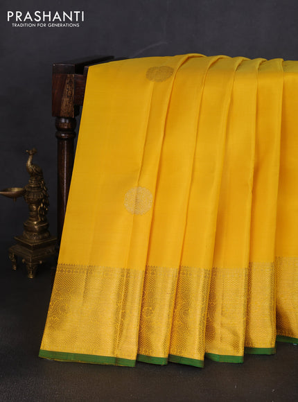 Pure kanchipuram silk saree yellow and green with zari woven buttas and zari woven border