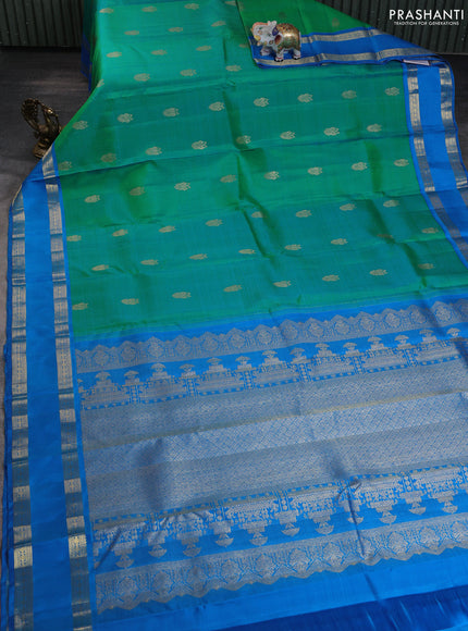 Pure kanchipuram silk saree dual shade of teal bluish green and cs blue with zari woven buttas and rettapet zari woven border