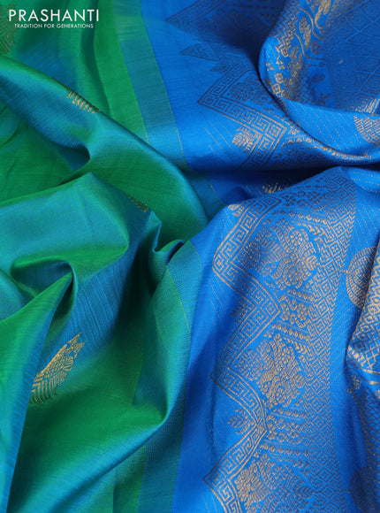 Pure kanchipuram silk saree dual shade of teal bluish green and cs blue with zari woven buttas and rettapet zari woven border