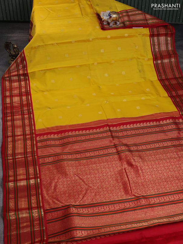 Pure kanchipuram silk saree yellow and red with zari woven buttas and long zari woven korvai border