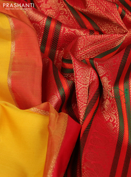 Pure kanchipuram silk saree yellow and red with zari woven buttas and long zari woven korvai border