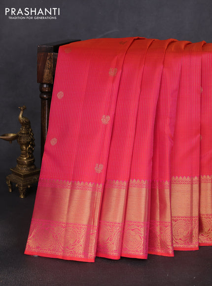Pure kanchipuram silk saree dual shade of pinkish orange with allover zari weaves & buttas and long zari woven border