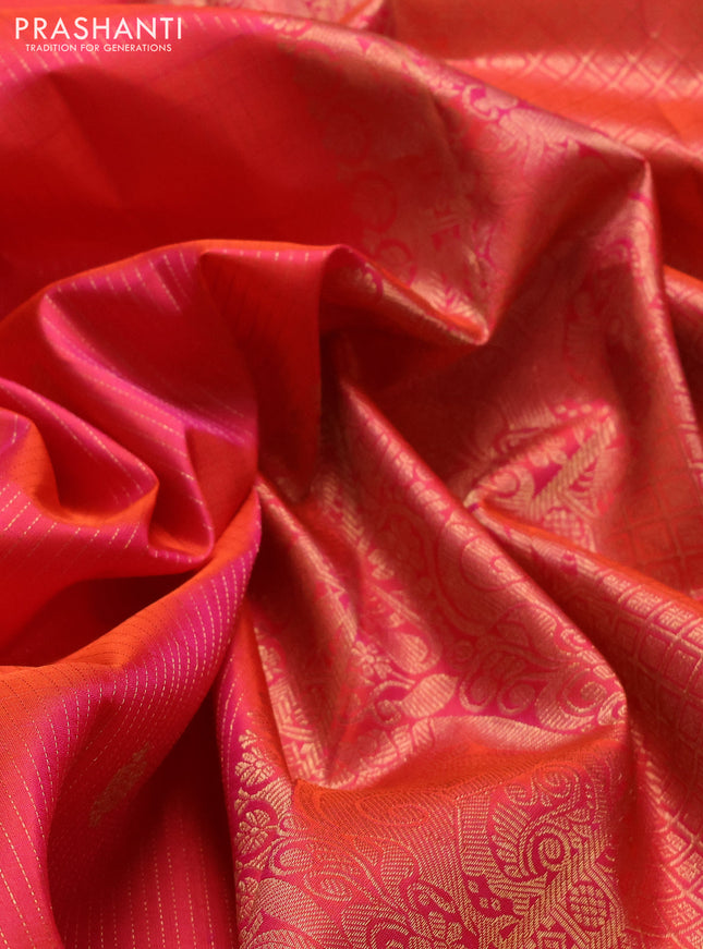 Pure kanchipuram silk saree dual shade of pinkish orange with allover zari weaves & buttas and long zari woven border