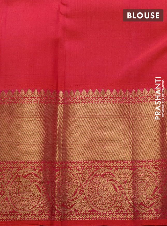 Pure kanchipuram silk saree dual shade of pinkish orange with allover zari weaves & buttas and long zari woven border