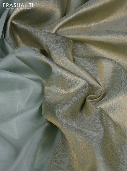 Pure kanchipuram silk saree pastel blue shade and orange with zari woven buttas and rich zari woven border